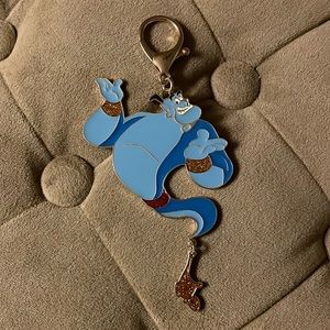 Disney Genie enamel keychain with dangle lamp. Total length is about 5.5”